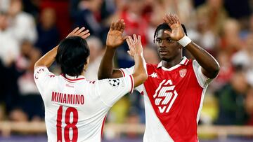 Soccer Football - Champions League - AS Monaco v Crvena Zvezda - Stade Louis II, Monaco - October 22, 2024 AS Monaco's Takumi Minamino celebrates scoring their fourth goal with Breel Embolo REUTERS/Manon Cruz