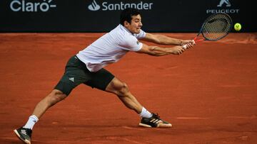 RIO DE JANEIRO, BRAZIL - FEBRUARY 23: Cristian Garin of Chile returns a shot to Gianluca Mager of Italy during the men's singles final match of the ATP Rio Open 2020 at Jockey Club Brasileiro on February 23, 2020 in Rio de Janeiro, Brazil. (Photo by Buda Mendes/Getty Images)