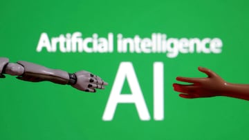 FILE PHOTO: Words reading "Artificial intelligence AI", miniature of robot and toy hand are pictured in this illustration taken December 14, 2023. REUTERS/Dado Ruvic/Illustration/File Photo