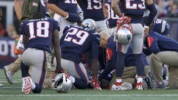 Nov 8, 2015; Foxborough, MA, USA; New England Patriots running back Dion Lewis (33) injured after a play against the Washington Redskins in the second half at Gillette Stadium. The Patriots defeated the Redskins 27-10. Mandatory Credit: David Butler II-USA TODAY Sports