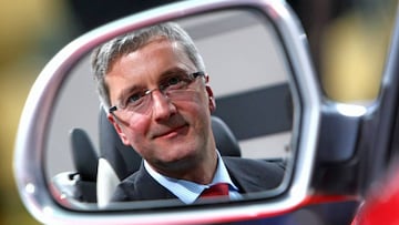 INGOLSTADT, GERMANY - MARCH 10:  Audi Chief Executive Officer Rupert Stadler looks in an Audi mirror after the annual news conference on March 10, 2009 in Ingolstadt, Germany. Volkswagen&#039;s Audi brand expects it may suffer a decline in vehicle sales in 2009 after posting 13 straight years of record volumes. The Audi Group expects that, following a marked downturn in the global economy in 2009, markets will stabilise in 2010.  (Photo by Alexander Hassenstein/Getty Images)