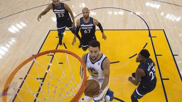 November 8, 2017; Oakland, CA, USA; Golden State Warriors guard Stephen Curry (30) shoots the basketball against Minnesota Timberwolves guard Jimmy Butler (23) during the first half at Oracle Arena. The Warriors defeated the Timberwolves 125-101. Mandatory Credit: Kyle Terada-USA TODAY Sports