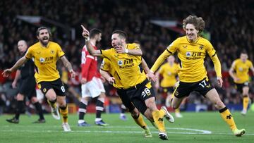 MANCHESTER, ENGLAND - JANUARY 03: Joao Moutinho of Wolverhampton Wanderers celebrates after scoring their side's first goal during the Premier League match between Manchester United and Wolverhampton Wanderers at Old Trafford on January 03, 2022 in Manchester, England. (Photo by Clive Brunskill/Getty Images)