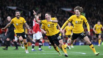 MANCHESTER, ENGLAND - JANUARY 03: Joao Moutinho of Wolverhampton Wanderers celebrates after scoring their side&#039;s first goal during the Premier League match between Manchester United and Wolverhampton Wanderers at Old Trafford on January 03, 2022 in Manchester, England. (Photo by Clive Brunskill/Getty Images)