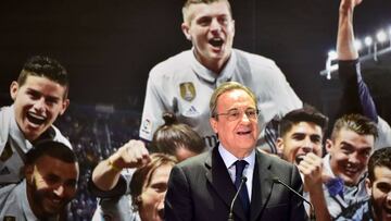 Real Madrid President Florentino Perez delivers a speech at the Madrid Town hall on Plaza Cibeles in Madrid on May 22, 2017 during a celeration after the team won the Spanish league football tournament.
Madrid sealed a first La Liga title in five years yesterday -- and 33rd in total -- with a 2-0 victory at Malaga to bring a halt to Barcelona's domination of domestic matters having won six of the previous eight titles.
/ AFP PHOTO / GERARD JULIEN