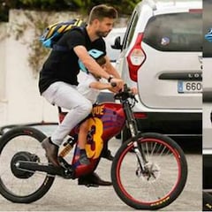 Piqué recoge a su hijo Milan del colegio en la bicicleta más culé