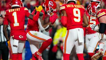 Dec 8, 2024; Kansas City, Missouri, USA; Kansas City Chiefs wide receiver DeAndre Hopkins (8) celebrates with teammate after scoring a touchdown during the first half against the Los Angeles Chargers at GEHA Field at Arrowhead Stadium. Mandatory Credit: Jay Biggerstaff-Imagn Images