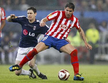 El navarro se ganó a la afición del Atlético por su entrega y profesionalidad. Dejó huella. Con el Atlético jugó 329 partidos, 71 en Europa (diez goles). Su debut continental fue el 21 de julio de 2007 ante el Gloria Bistrita, en la ida, con derrota por 2-1. Ganó seis títulos, tres de ellos europeos: una Europa League y dos Supercopas de Europa. Jugó la final de Champions en Lisboa de 2014 ante el Real Madrid. Además, ganó una Liga, una Copa y una Supercopa de España. 