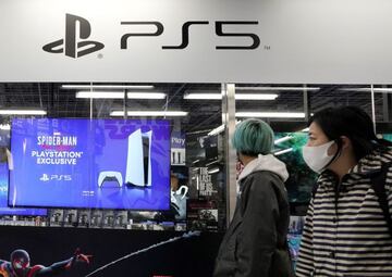 Excitement growing | Visitors walk past Sony's PlayStation 5 (PS5) corner in Tokyo, Japan.