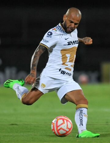Pumas' Dani Alves kicks the ball during their Mexican Apertura 2022 tournament football match at the University Olympic stadium in Mexico City, on August 24, 2022. (Photo by VICTOR CRUZ / AFP)