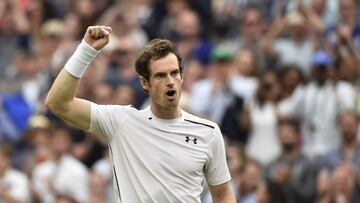 Andy Murray of Britain celebrates his win over John Millman of Australia in their third round match during the Wimbledon Championships 