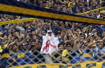 Boca Junior supporters celebrate after their team won Argentina's first division football championship at La Bombonera stadium in Buenos Aires, on June 25, 2017