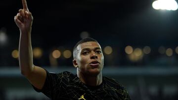 Paris Saint-Germain's French forward Kylian Mbappe gestures during the French L1 football match between AJ Auxerre and Paris Saint-Germain (PSG) at Stade de l'Abbe-Deschamps in Auxerre, central France, on May 21, 2023. (Photo by JULIEN DE ROSA / AFP)