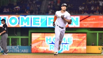 MIAMI, FL - AUGUST 11: Giancarlo Stanton #27 of the Miami Marlins rounds second base after hitting his 40th home run of the season in the sixth inning against the Colorado Rockies at Marlins Park on August 11, 2017 in Miami, Florida.   Eric Espada/Getty Images/AFP
 == FOR NEWSPAPERS, INTERNET, TELCOS &amp; TELEVISION USE ONLY ==