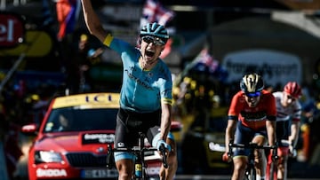 Denmark&#039;s Magnus Nielsen (L) celebrates as he crosses the finish line to win, ahead of Spain&#039;s Jon Izagirre (R) and Netherlands&#039; Bauke Mollema (Rear R) the 15th stage of the 105th edition of the Tour de France cycling race, between Millau a