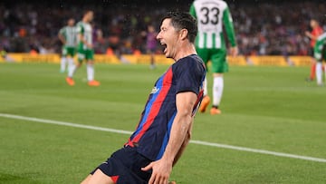 Barcelona's Polish forward Robert Lewandowski celebrates scoring his team's second goal during the Spanish league football match between FC Barcelona and Real Betis at the Camp Nou stadium in Barcelona on April 29, 2023. (Photo by Josep LAGO / AFP)