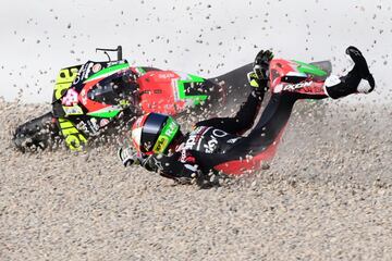 TOPSHOT - Aprilia Racing Team Gresini Spanish rider crashes during the third MotoGP free practice session of the Moto Grand Prix de Catalunya at the Circuit de Catalunya on September 26, 2020 in Montmelo on the outskirts of Barcelona. (Photo by LLUIS GENE / AFP)