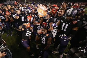 PHOENIX, ARIZONA - DECEMBER 26: The TCU Horned Frogs clebrate after defeating the California Golden Bears in the Cheez-it Bowl at Chase Field on December 26, 2018 in Phoenix, Arizona. The Horned Frogs defeated the Golden Bears 10-7 in overtime.