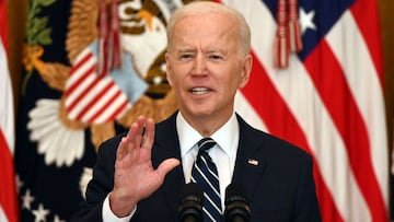 (FILES) In this file photo taken on March 25, 2021, US President Joe Biden answers a question during his first press briefing in the East Room of the White House in Washington, DC. - Biden has suggested founding an initiative from "democratic" c
