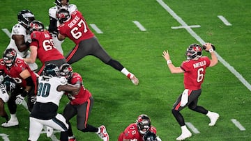 TAMPA, FLORIDA - JANUARY 15: Baker Mayfield #6 of the Tampa Bay Buccaneers throws a pass against the Philadelphia Eagles during the first quarter in the NFC Wild Card Playoffs at Raymond James Stadium on January 15, 2024 in Tampa, Florida.   Julio Aguilar/Getty Images/AFP (Photo by Julio Aguilar / GETTY IMAGES NORTH AMERICA / Getty Images via AFP)