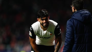 Omar Alderete of Valencia gets injured during the Spanish League, La Liga Santander, football match played between Atletico de Madrid and Valencia CF at Wanda Metropolitano stadium on January 22, 2022, in Madrid, Spain.
 AFP7 
 22/01/2022 ONLY FOR USE IN 