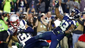 Feb 1, 2015; Glendale, AZ, USA; New England Patriots strong safety Malcolm Butler (21) intercepts a pass intended for Seattle Seahawks wide receiver Ricardo Lockette (83) in the fourth quarter in Super Bowl XLIX at University of Phoenix Stadium. Mandatory Credit: Mark J. Rebilas-USA TODAY Sports