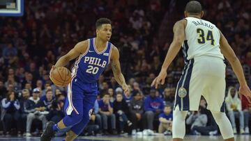 Mar 26, 2018; Philadelphia, PA, USA; Philadelphia 76ers guard Markelle Fultz (20) dribbles the ball as Denver Nuggets guard Devin Harris (34) defends during the first quarter of the game at the Wells Fargo Center. Mandatory Credit: John Geliebter-USA TODAY Sports