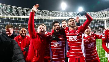 Soccer Football - Champions League - Brest v PSV Eindhoven - Stade de Roudourou, Guingamp, France - December 10, 2024 Brest's Axel Camblan, Mahdi Camara, Ibrahim Salah and teammates celebrate after the match REUTERS/Stephane Mahe