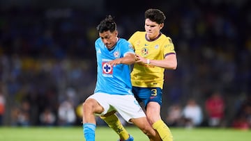 Angel Sepulveda (L) of Cruz Azul fights for the ball with Israel Reyes (R) of America during the Semi-Final first leg match between Cruz Azul and America as part of the Liga BBVA MX, Torneo Clausura 2025 at Olimpico Universitario Stadium on May 15, 2025 in Mexico City, Mexico.
