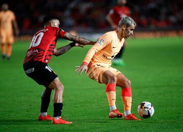 Antonio Sánchez y Antoine Griezmann.