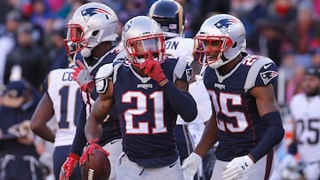FOXBORO, MA - DECEMBER 04: Malcolm Butler #21 of the New England Patriots reacts with Eric Rowe #25 after intercepting Jared Goff #16 of the Los Angeles Rams (not pictured) during the first half at Gillette Stadium on December 4, 2016 in Foxboro, Massachusetts. Jim Rogash/Getty Images/AFP
== FOR NEWSPAPERS, INTERNET, TELCOS & TELEVISION USE ONLY ==