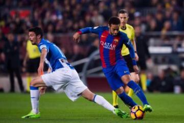 BARCELONA, SPAIN - FEBRUARY 19:  Neymar Santos Jr of FC Barcelona dribbles past Erik Moran of CD Leganes during the La Liga match between FC Barcelona and CD Leganes at Camp Nou stadium on February 19, 2017 in Barcelona, Spain.  (Photo by Alex Caparros/Ge