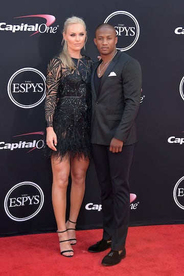 Lindsey Vonn y el entrenador de la NFL Kenan Smith.