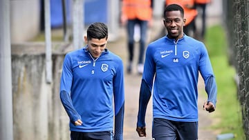 KRC Genk's Mexico defender Gerardo Arteaga (L) and Genk's Colombian defender Carlos Cuesta arrive for a training session with teammates in Genk on August 16, 2023, on the eve of their match against Greek Olympiacos F.C., the return game in the third qualifying round of the UEFA Europa League. (Photo by Johan Eyckens / Belga / AFP) / Belgium OUT