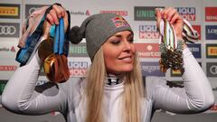 Alpine Skiing - FIS Alpine World Ski Championships - Women&#039;s Downhill - Are, Sweden - February 10, 2019 - Bronze medalist Lindsey Vonn of the U.S. poses with medals during a news conference. REUTERS/Denis Balibouse