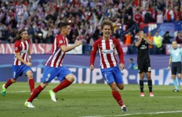 Griezmann celebrates scoring from 12 yards.