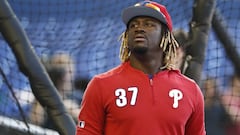 FILE - In this April 12, 2019, file photo, Philadelphia Phillies center fielder Odubel Herrera gets ready for the team&#039;s baseball game against the Miami Marlins in Miami. Herrera has accepted a suspension for the rest of the season under Major League Baseball&acirc;s domestic violence policy. The commissioner&acirc;s office announced the decision Friday, July 5, two days after domestic assault charges against him in Atlantic City, N.J., were dismissed. He had been charged with simple assault and knowingly causing bodily injury stemming from an incident on May 27 at the Golden Nugget Casino. The woman, his girlfriend, declined to press charges. (AP Photo/Brynn Anderson, File)