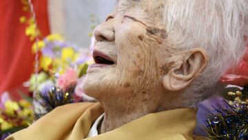 FILE PHOTO: Kane Tanaka, born in 1903, smiles as a nursing home celebrates three days after her 117th birthday in Fukuoka, Japan, in this photo taken by Kyodo January 5, 2020. Mandatory credit Kyodo/via REUTERS ATTENTION EDITORS - THIS IMAGE WAS PROVIDED BY A THIRD PARTY. MANDATORY CREDIT. JAPAN OUT. NO COMMERCIAL OR EDITORIAL SALES IN JAPAN./File Photo