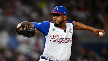 Dominican Republic's pitcher #16 Fernando Abad throws the ball during the Caribbean Series baseball game between Venezuela and the Dominican Republic at LoanDepot Park in Miami, Florida, on February 1, 2024. (Photo by CHANDAN KHANNA / AFP)