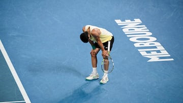 Spain's Carlos Alcaraz reacts after a point against Germany's Alexander Zverev during their men's singles quarter-final match on day 11 of the Australian Open tennis tournament in Melbourne on January 24, 2024. (Photo by WILLIAM WEST / AFP) / -- IMAGE RESTRICTED TO EDITORIAL USE - STRICTLY NO COMMERCIAL USE --
