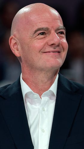 International Association Football Federation (FIFA) President Gianni Infantino looks on at the end of the women�s singles final match, at the Qatar Open tennis tournament in Doha on February 14, 2026. (Photo by Karim JAAFAR / AFP)