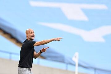 Manchester City's Spanish manager Pep Guardiola gestures from the touchline during the English FA Cup semi-final football match between Arsenal and Manchester City at Wembley Stadium in London, on July 18, 2020.