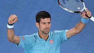 Serbia's Novak Djokovic celebrates his win against Spain's Fernando Verdasco during their men's singles match on day two of the Australian Open tennis tournament in Melbourne on January 17, 2017. / AFP PHOTO / WILLIAM WEST / IMAGE RESTRICTED TO EDITORIAL USE - STRICTLY NO COMMERCIAL USE