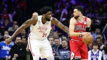 PHILADELPHIA, PENNSYLVANIA - MARCH 20: Joel Embiid #21 of the Philadelphia 76ers guards Zach LaVine #8 of the Chicago Bulls during the third quarter at Wells Fargo Center on March 20, 2023 in Philadelphia, Pennsylvania. NOTE TO USER: User expressly acknowledges and agrees that, by downloading and or using this photograph, User is consenting to the terms and conditions of the Getty Images License Agreement.   Tim Nwachukwu/Getty Images/AFP (Photo by Tim Nwachukwu/Getty Images) (Photo by Tim Nwachukwu / GETTY IMAGES NORTH AMERICA / Getty Images via AFP)