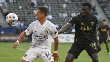 CARSON, CA - MAY 08: Javier Hernandez #14 of Los Angeles Galaxy and Jesus Murillo #94 of Los Angeles FC battle in the second half at Dignity Health Sports Park on May 8, 2021 in Carson, California. The Galaxy won 2-1.   John McCoy/Getty Images/AFP
 == FOR NEWSPAPERS, INTERNET, TELCOS &amp; TELEVISION USE ONLY ==