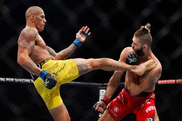 NEW YORK, NEW YORK - NOVEMBER 11: Alex Pereira of Brazil kicks Jiri Prochazka of the Czech Republic in the UFC light heavyweight championship fight during the UFC 295 event at Madison Square Garden on November 11, 2023 in New York City.   Sarah Stier/Getty Images/AFP (Photo by Sarah Stier / GETTY IMAGES NORTH AMERICA / Getty Images via AFP)