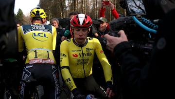 Team Visma-Lease a Bike's Danish rider Jonas Vingegaard (R) reacts next to Team Visma-Lease a Bike's US rider Matteo Jorgenson (L) at the end of the 4th stage of the Paris-Nice cycling race, 163,4 km between Vichy and La Loge des Gardes, on March 12, 2025. (Photo by Anne-Christine POUJOULAT / AFP)