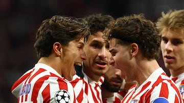 Soccer Football - UEFA Champions League - Atletico Madrid v Inter Milan - Riyadh Air Metropolitano, Madrid, Spain - November 26, 2025 Atletico Madrid's Julian Alvarez celebrates scoring their first goal with Giuliano Simeone REUTERS/Susana Vera
