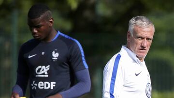 Deschamps junto a Pogba.