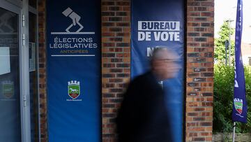 A man leaves a polling station after voting in the first round of the early French parliamentary elections, in Henin-Beaumont, France, June 30, 2024. REUTERS/Yves Herman